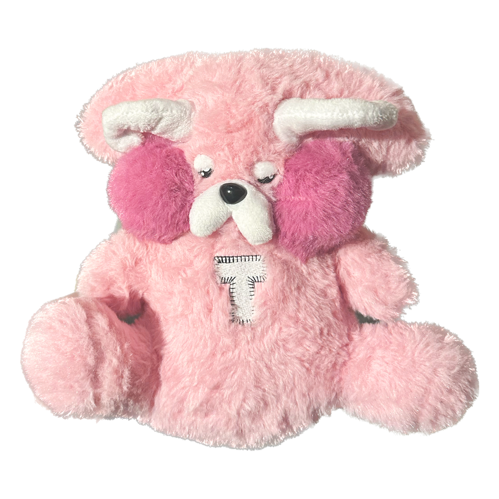 Turnstile's highly coveted pink plushie bear measures 7" tall and features soft horns and wings with a custom "T" patch sewn onto the belly. Plushie made in collaboration with Plushie Love.