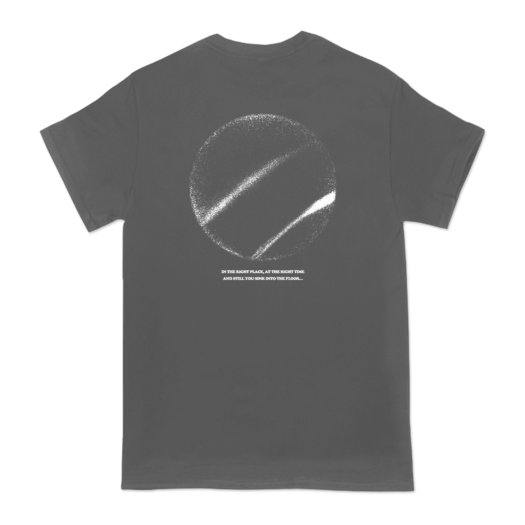 Turnstile's "Right Place Right Time" design, printed on the front and back of a charcoal tee with a custom woven tag.