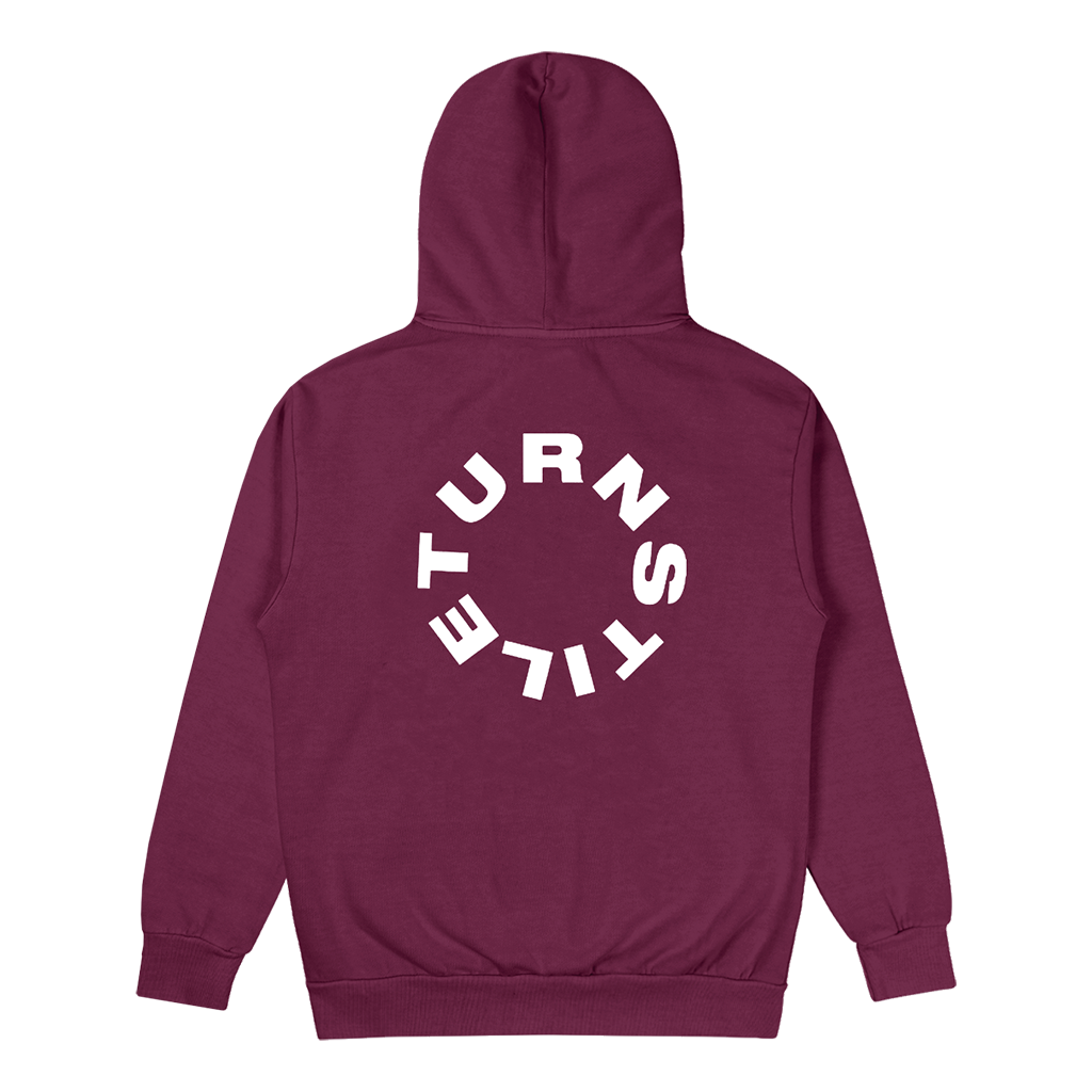 Turnstile's "Never Enough Stage" design, printed on the front and back of a maroon hoodie with a custom woven tag.