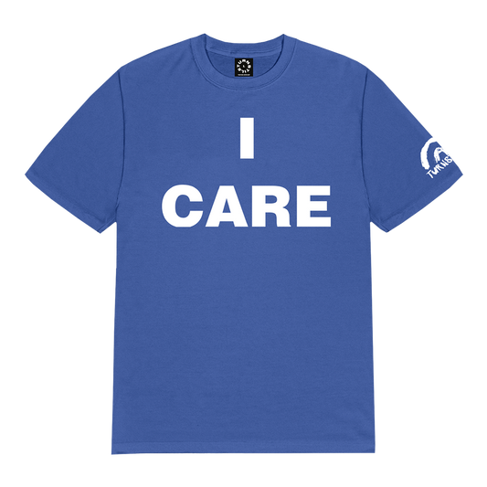 Turnstile's "I Care" design, printed on the front and left sleeve of a blue tee with a custom woven tag.