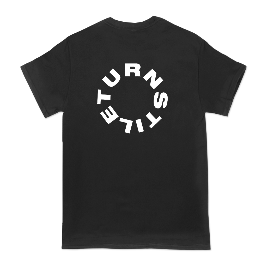 Turnstile's limited "Live Birds" design, printed on the front and back of a black tee with a custom printed tag.
