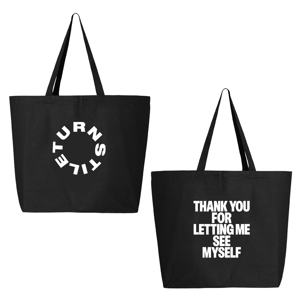 Turnstile's "Thank You" design, printed on the front and back of a black tote bag.